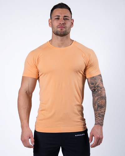 Cheeky Coral Alphalete High Performance Seamless Short Sleeve Tee | OWDVZN619