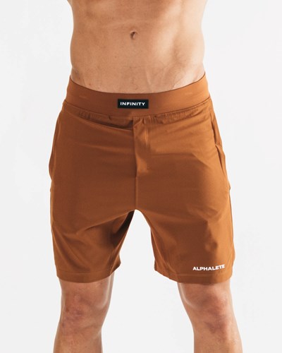 Spice Alphalete Woven 4-Way Stretch 7" Short | UALQYO251