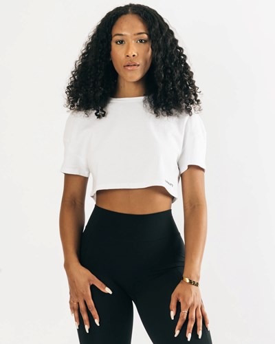 White Alphalete Heavy Cotton Dropped Shoulder Crop | YXIQWZ542