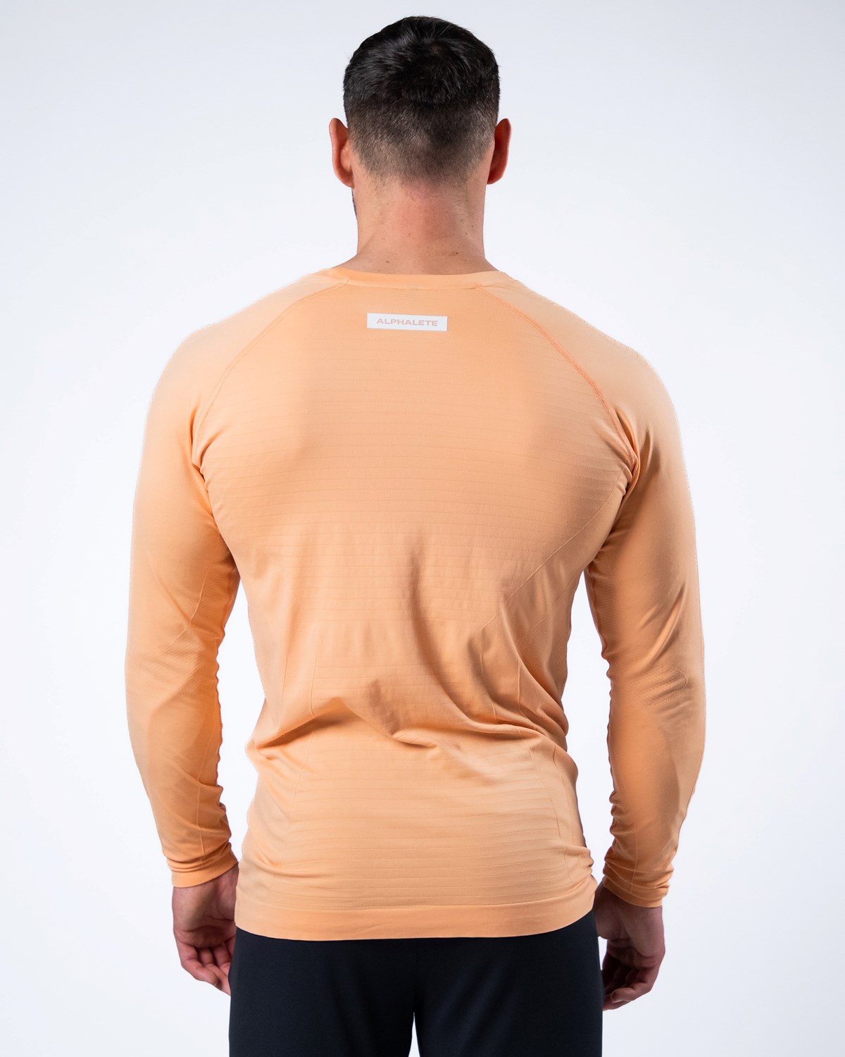 Cheeky Coral Alphalete High Performance Seamless Long Sleeve Tee | TJUDIA270