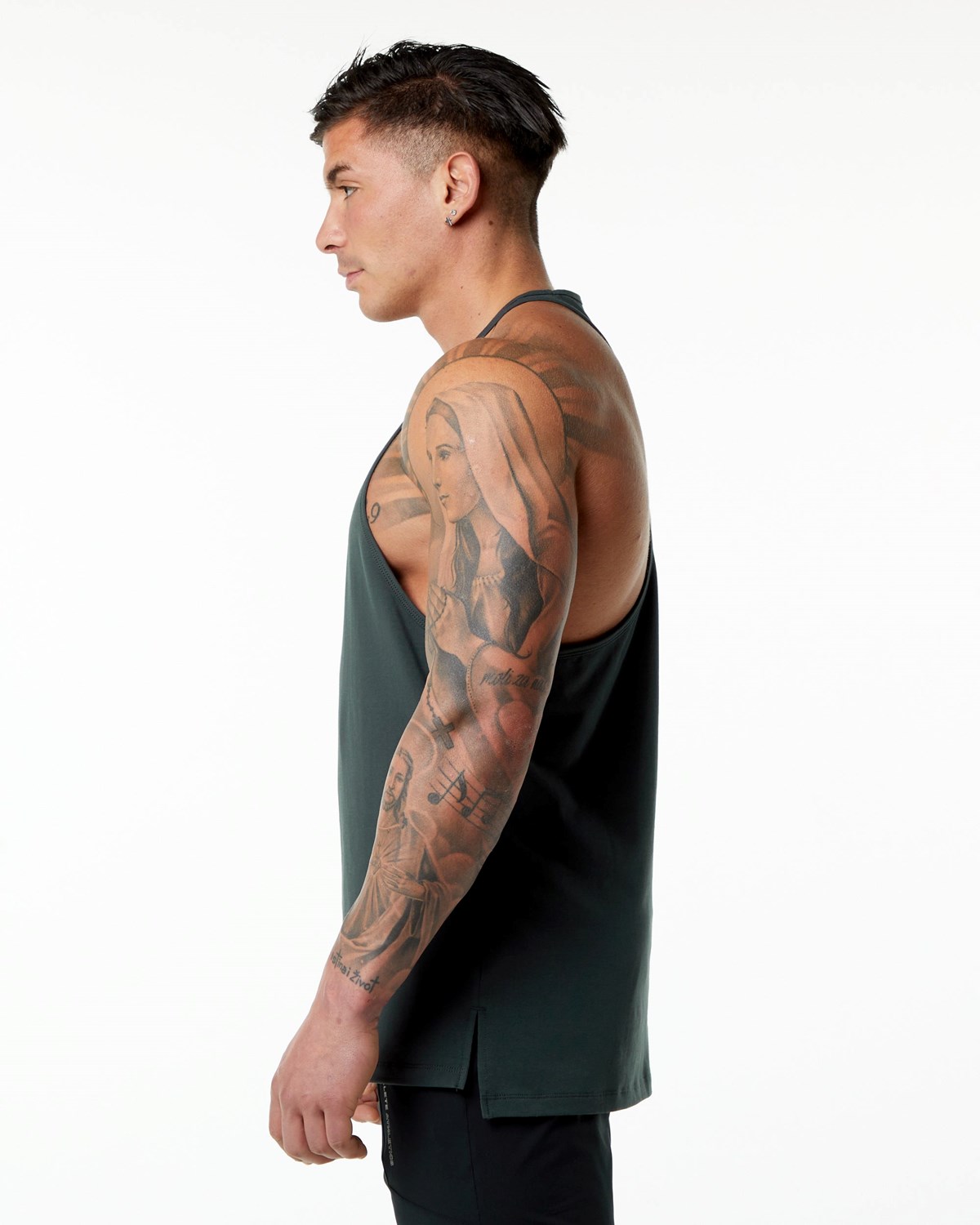 Hunter Green Alphalete Stepped Hem Stringer | IHSOMX965