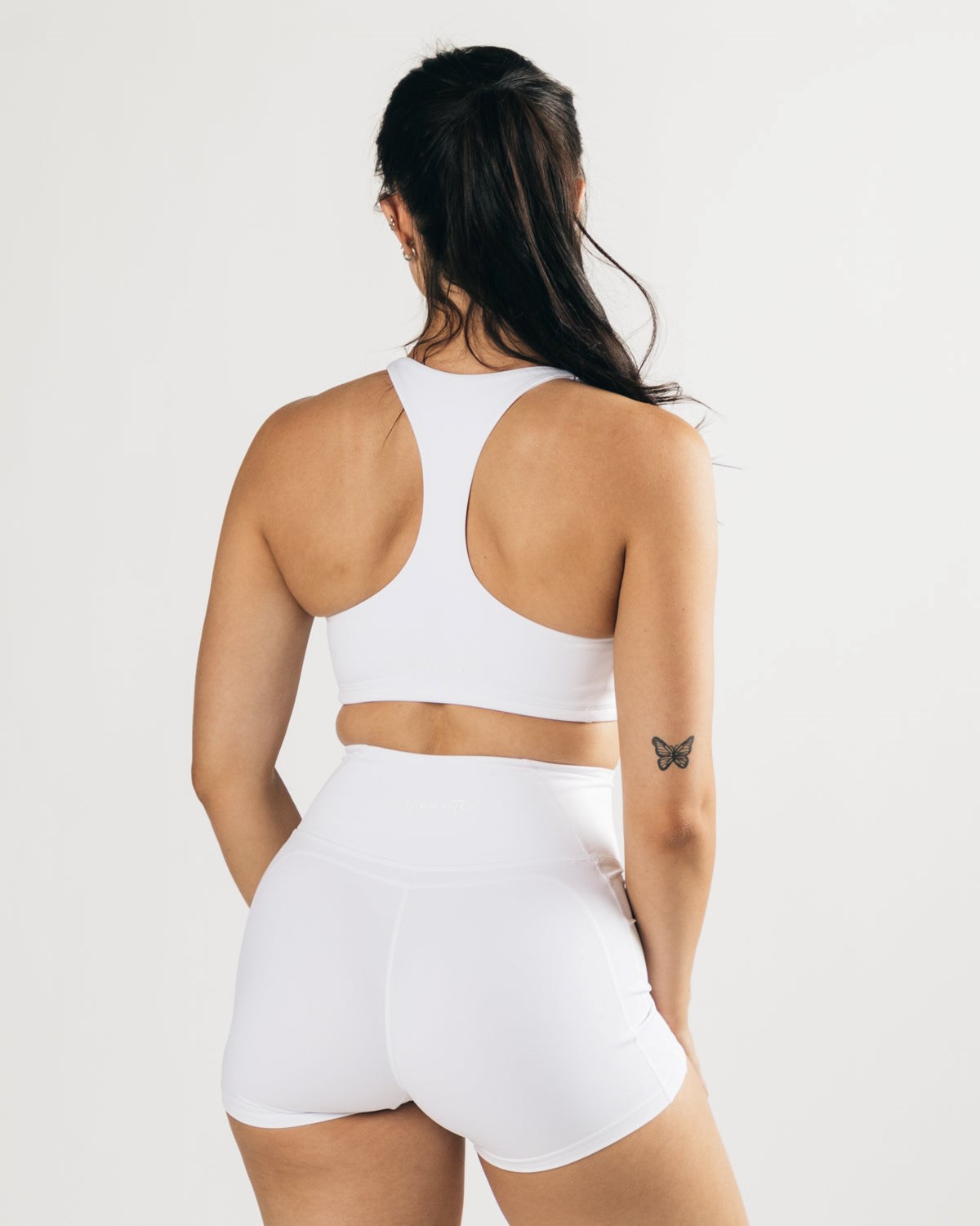 White Alphalete Medium-Support One Piece Sports Bra | KGOJAP743